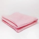 Coperta artigianale rosa fatta a mano dalla Sartoria Sociale POPSart in tessuti morbidi e fantasiosi, unica e colorata, ideale per divano o letto.